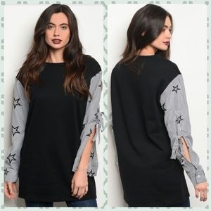 Womens Black top with star sleeves size M